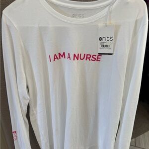 FIGS Women's Long Sleeve White Top with Pink Text